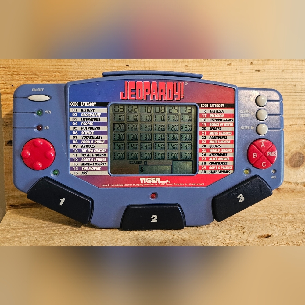 1995 Tiger Electronics Jeopardy Handheld Game W/ 1 Card, No Book USED